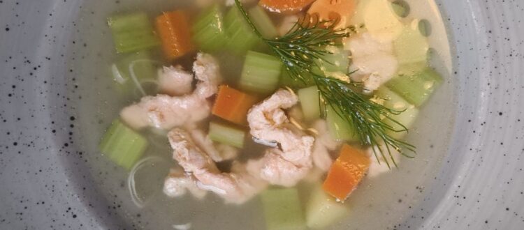 Light and fresh salmon soup with vegetables and dill, northern German and Scandinavian style