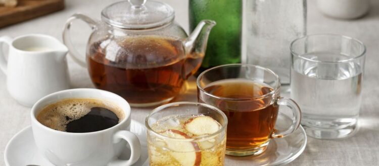 German drinking habits with coffee, tea, sparkling water, juice, and Apfelschorle in everyday life.